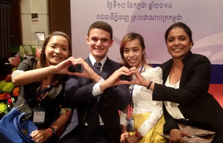 Andrew Dunn and his co-workers at a Bima Cambodia launch event