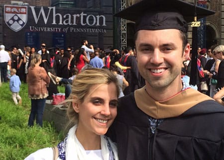 Wharton MBA grad Michael Taormina with his fiancee Sarah at Commencement.