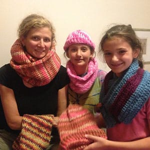 Michael Goldberg's wife Stacy and his daughters Kate and Anna enjoying their ITEZO knitted scarves