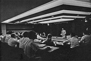 A 1979 National Health Care Management Center meeting of faculty senior fellows and staff held in LDI's auditorium. During this period, the room on the ground floor of the LDI building was also the venue for executive education sessions attended by health care managers from across the country.