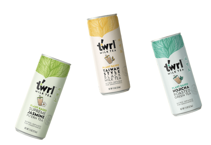 Three cans of Twrl Milk Tea in different flavors.