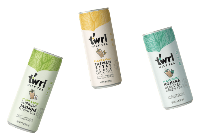 Three cans of Twrl Milk Tea in different flavors.