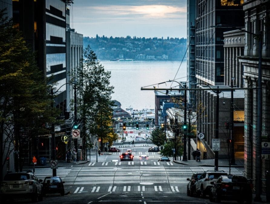A nearly empty Seattle street in the evening.