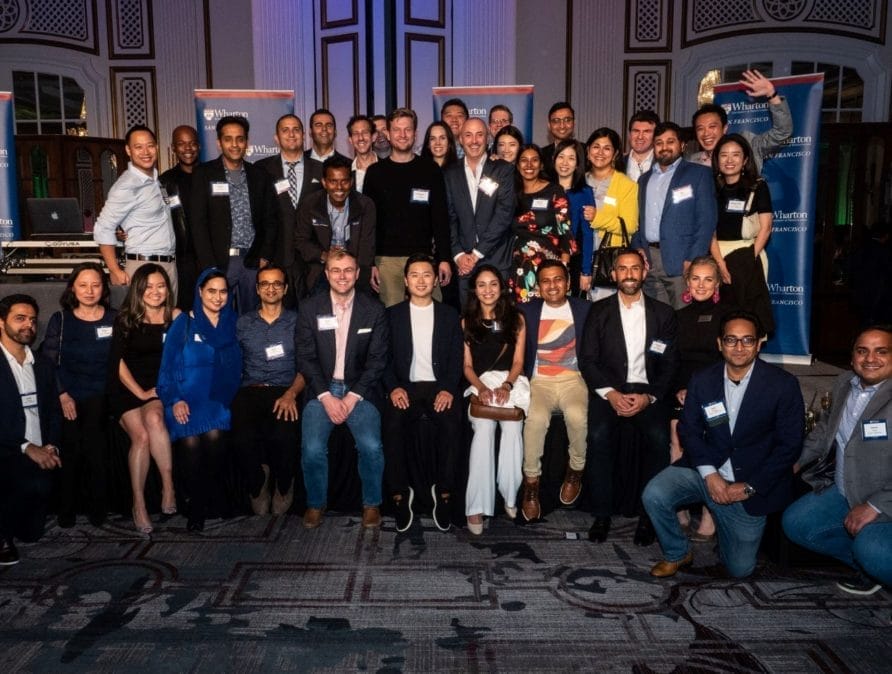 Attendees gathered for a group photo at the Wharton San Francisco campus 20th anniversary celebration.