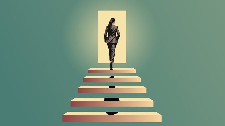 A woman in a business suit steps through a lit doorway.