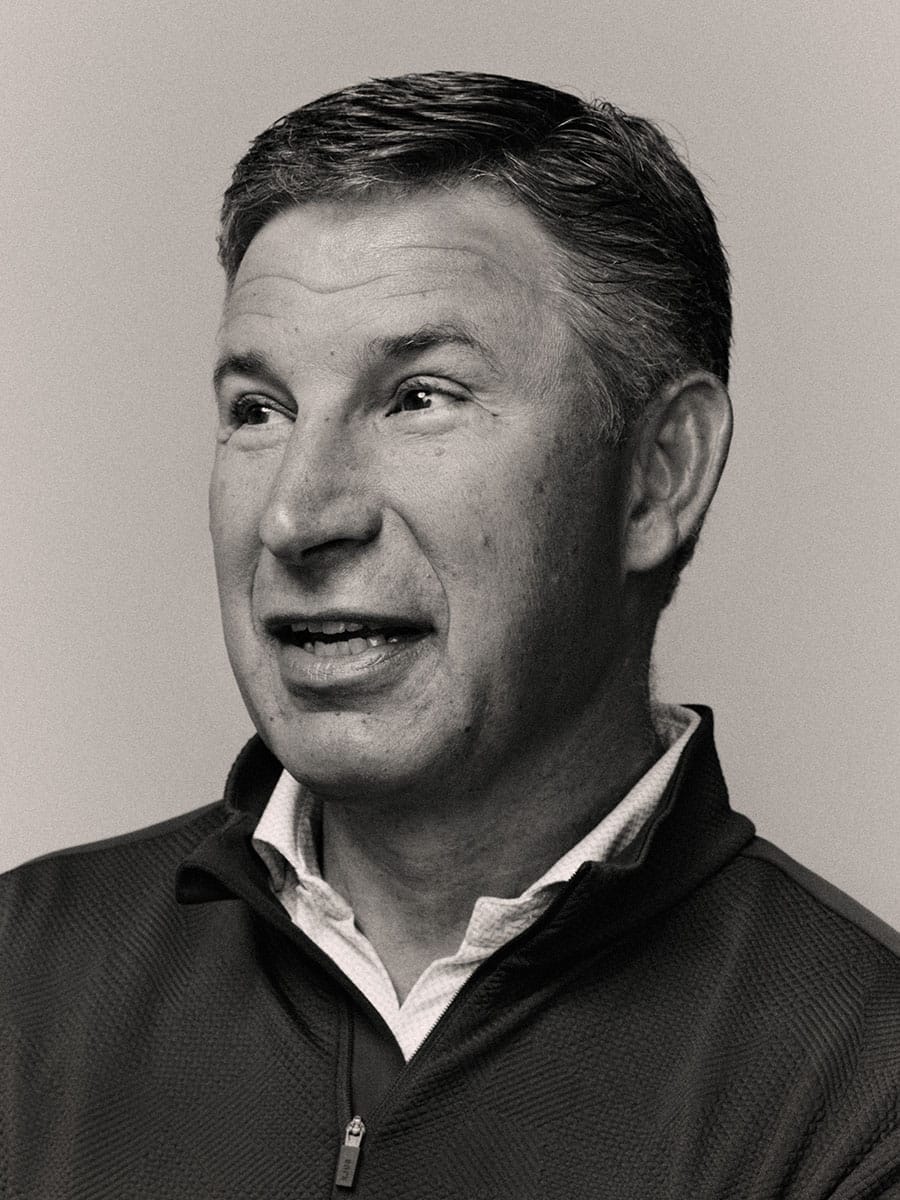 Portrait of Anthony Noto in a quarter-zip shirt looking to the left.