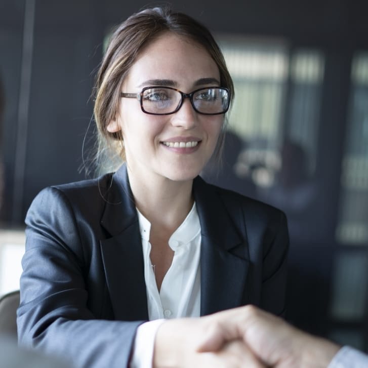 Businesswomen shaking hands