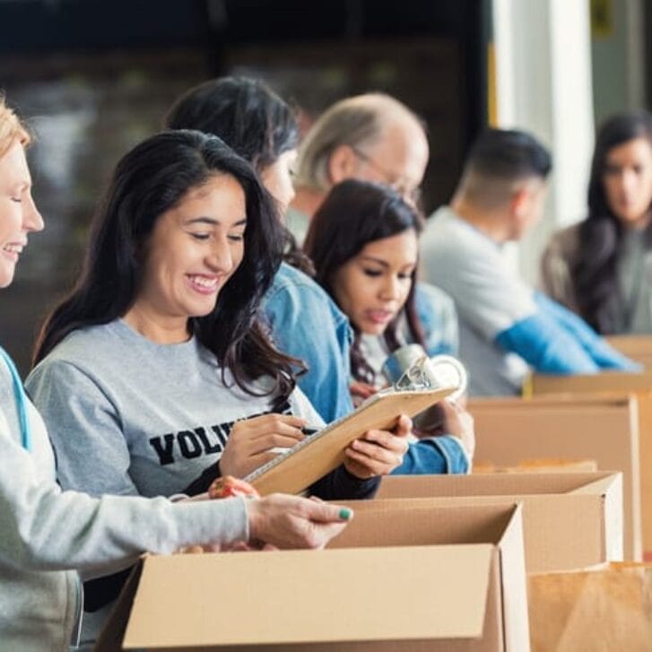 Volunteers packing boxes