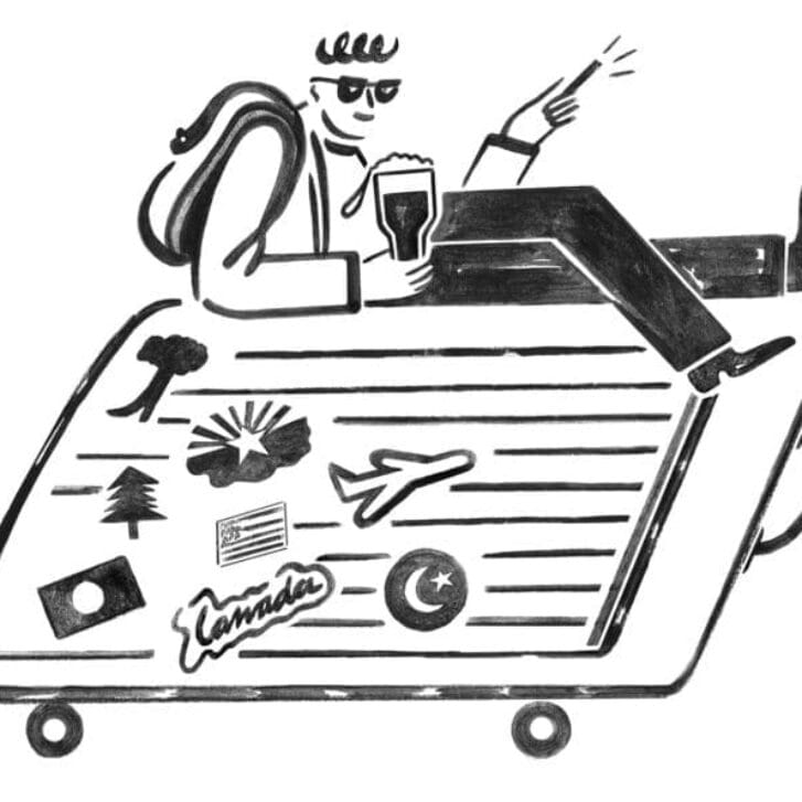 Man sitting on suitcase