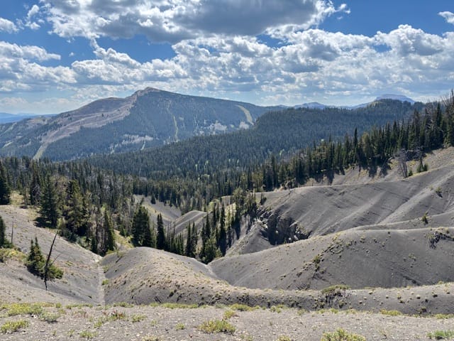 View of a mountain with a cloudy sky above