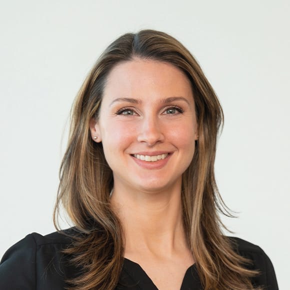 Headshot of a woman smiling.