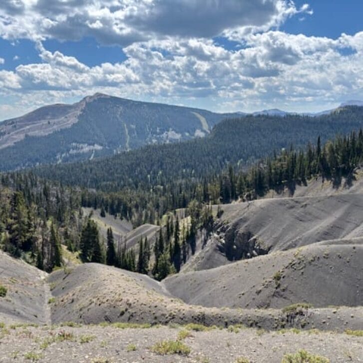 View of a mountain with a cloudy sky above