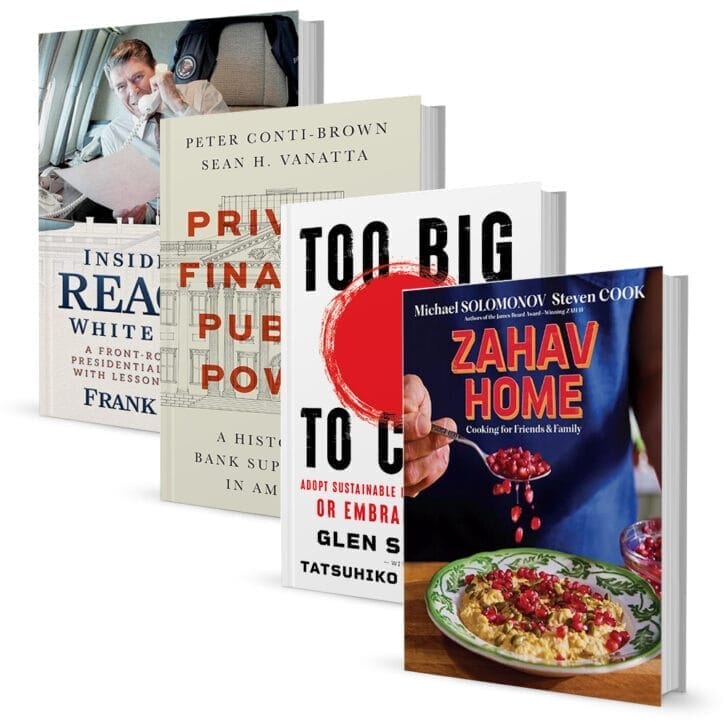 Four books arranged together.