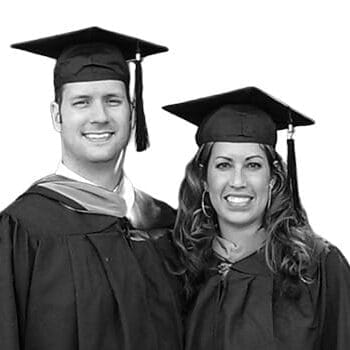 A man and a woman in graduation attire.