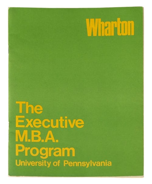 A green brochure with the words "The Executive MBA Program" printed on it.