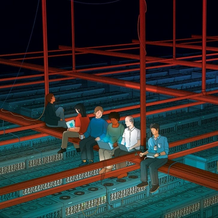 Six people sit on a steel frame above a room full of computer servers. The people are staring at laptops themselves.